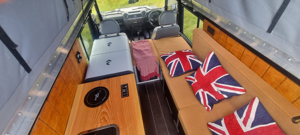Overlanding side seating with top hatches and base flap doors